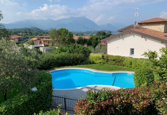Casa a schiera a Manerba del Garda - Casa Delisa: in residence curato con piscina e non lontano dal lago