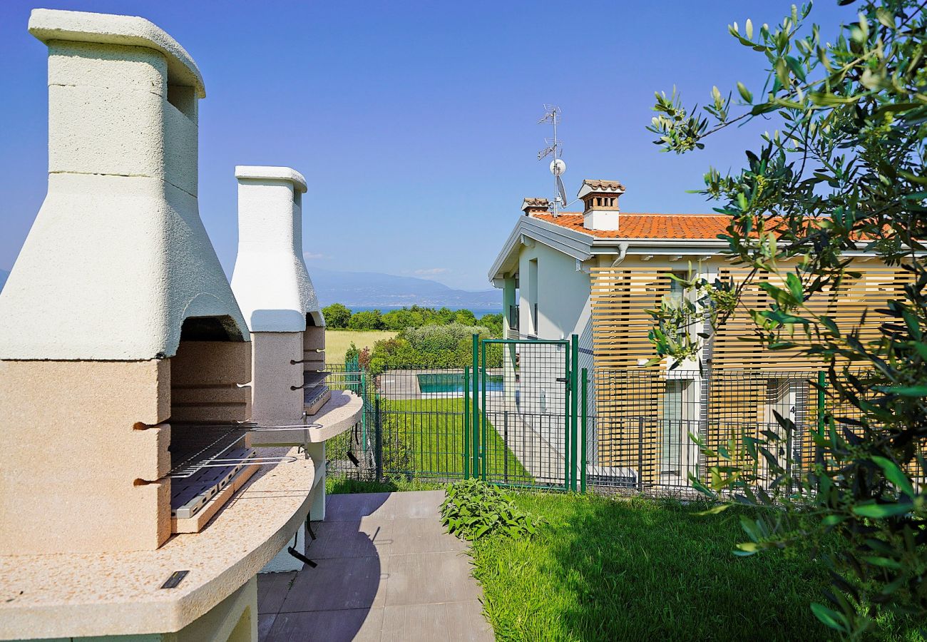 Casa a schiera a Manerba del Garda - Gardaliva2: con vista lago in residence con piscina vicino al lago