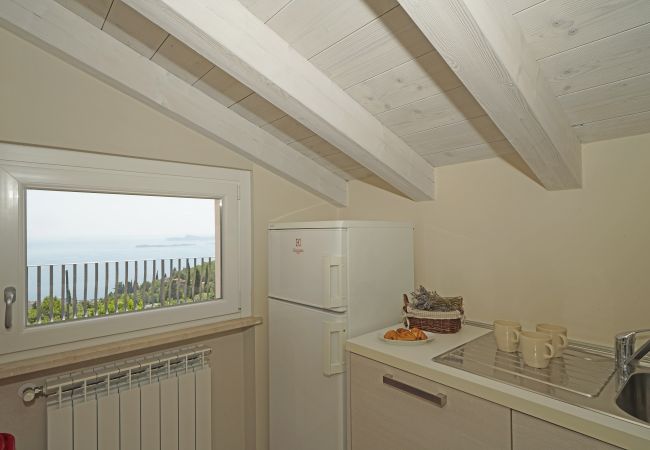 Ferienwohnung in Toscolano-Maderno - Cà Rossa - Orchidea mit wunderbarer Seeblick Ferienwohnung in Toscolano-Maderno - Cà Rossa - Orchidea mit wunderbarer Seeblick