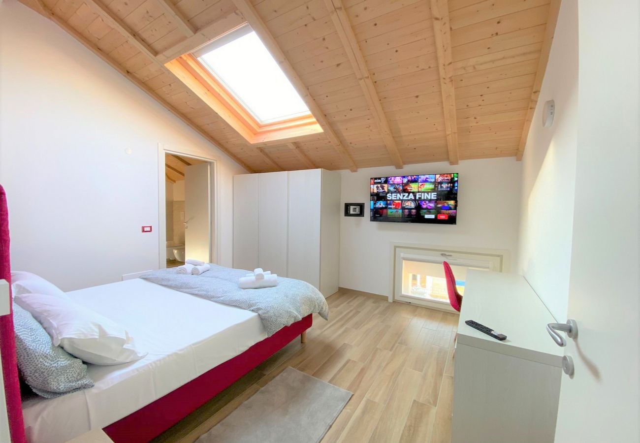 Sypialnia z prywatną łazienką w Palazzo Visconti